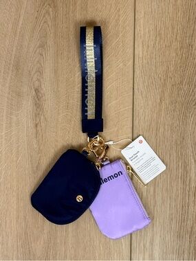 NWT Lululemon Dual Pouch Navy and Lavender Wordmark